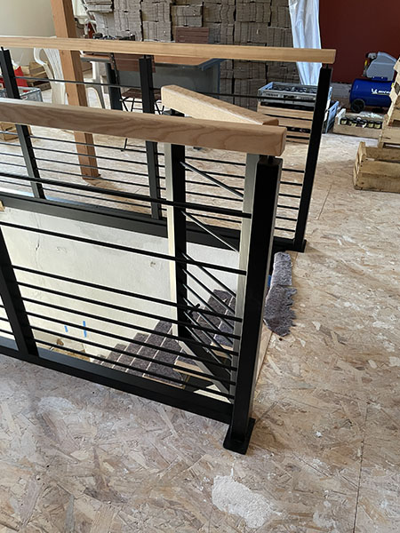 Escalier en bois et crémaillière métalique